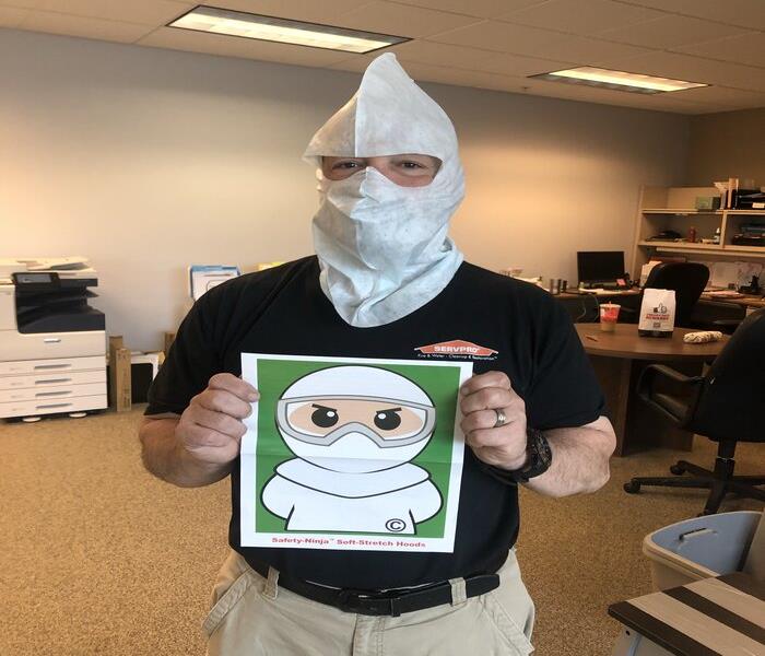 SERVPRO Professional Guy Massaro in Safety-Ninja hooded mask.  