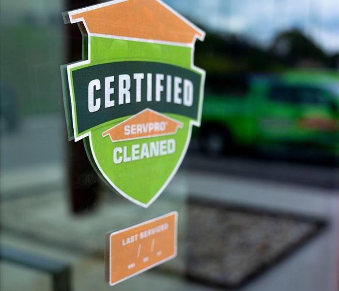 Certified: SERVPRO Cleaned sticker on window. 